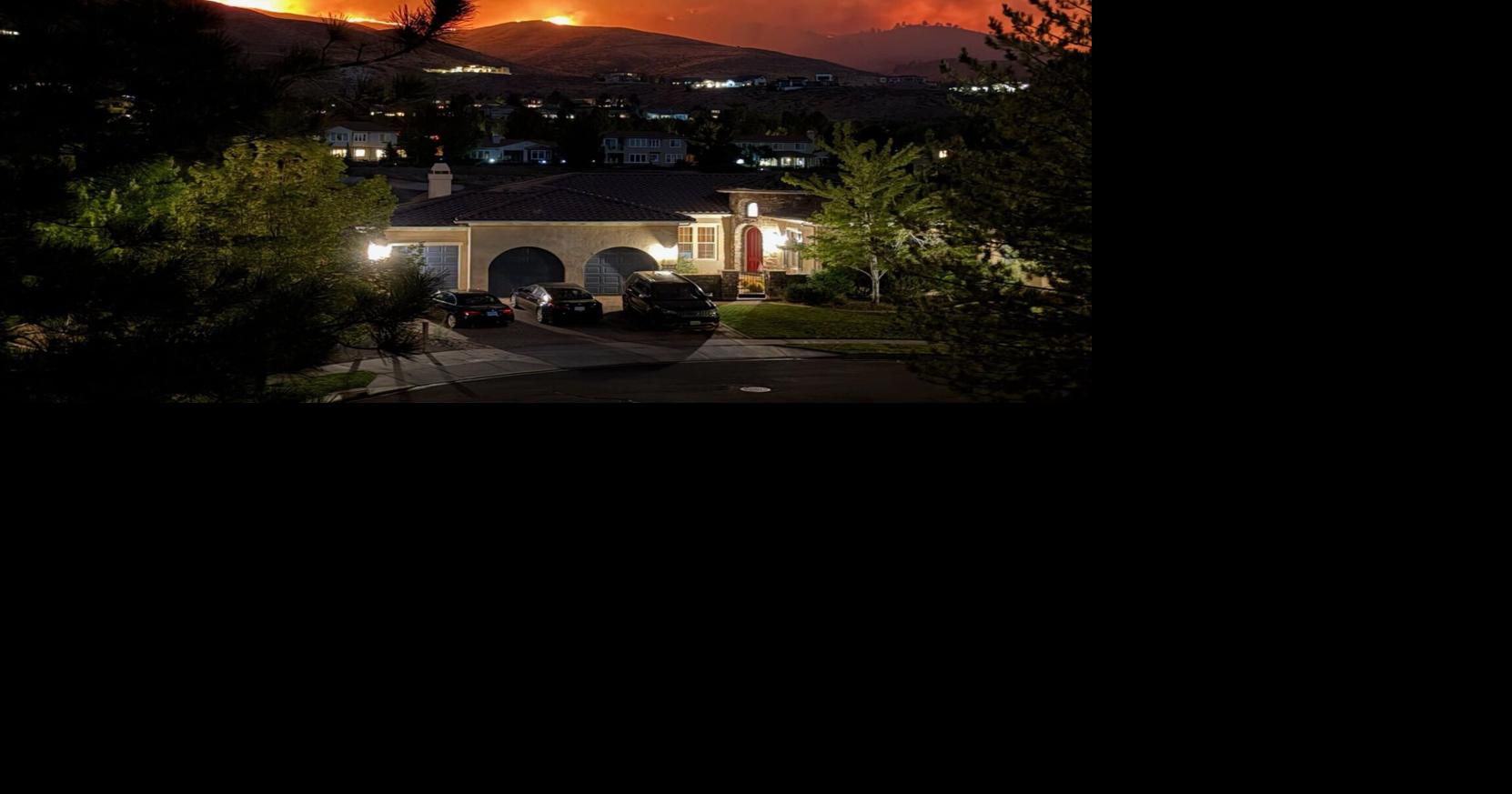 Reno-area wildfire's advance has stopped, but work remains before evacuees can return, official says