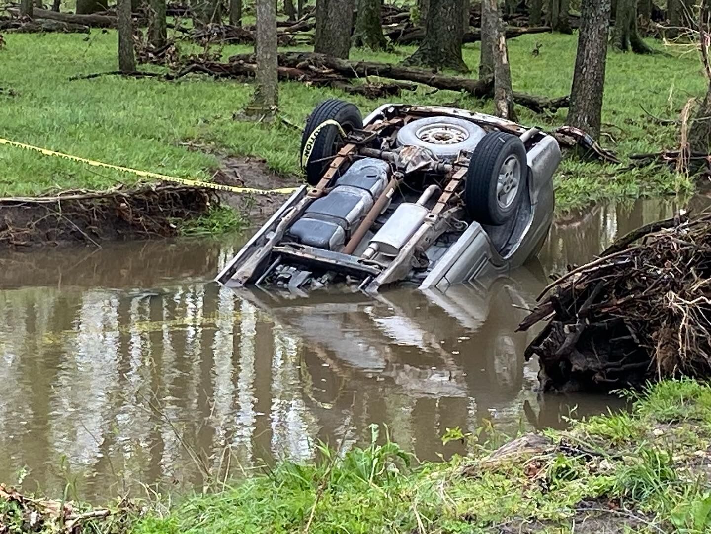 SUV Swept Off Roadway Nearly Into Spring River After Driving Around ...