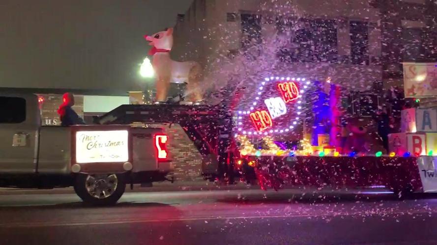 Joplin Christmas Parade 2022, White Oak Cabinets shoot off snow during the parade!