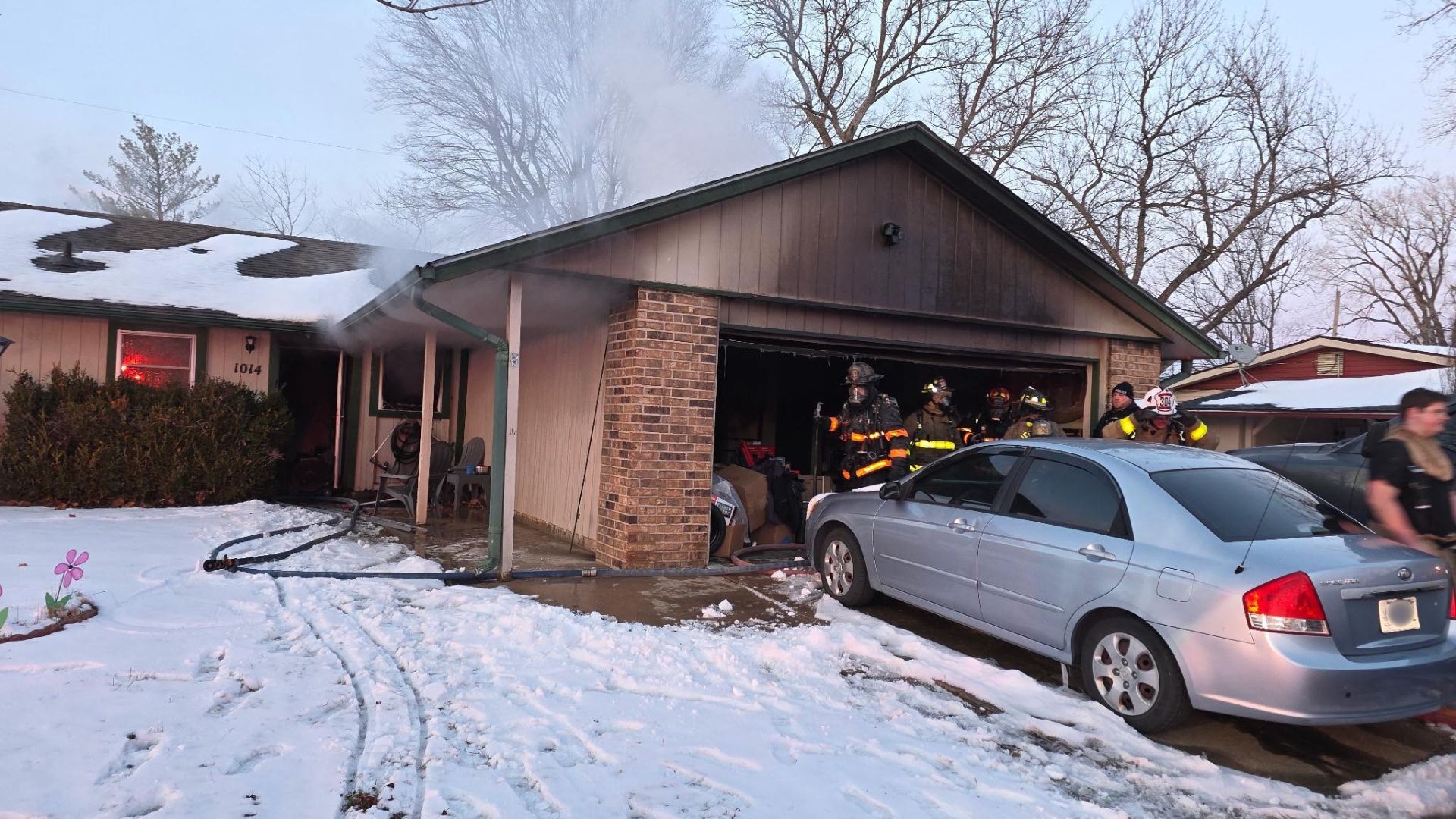 Fire crews battle house fire in Independence; three dogs rescued ...