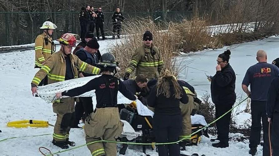 Woman and her dog fall through ice on pond, Water Rescue Team perform ...