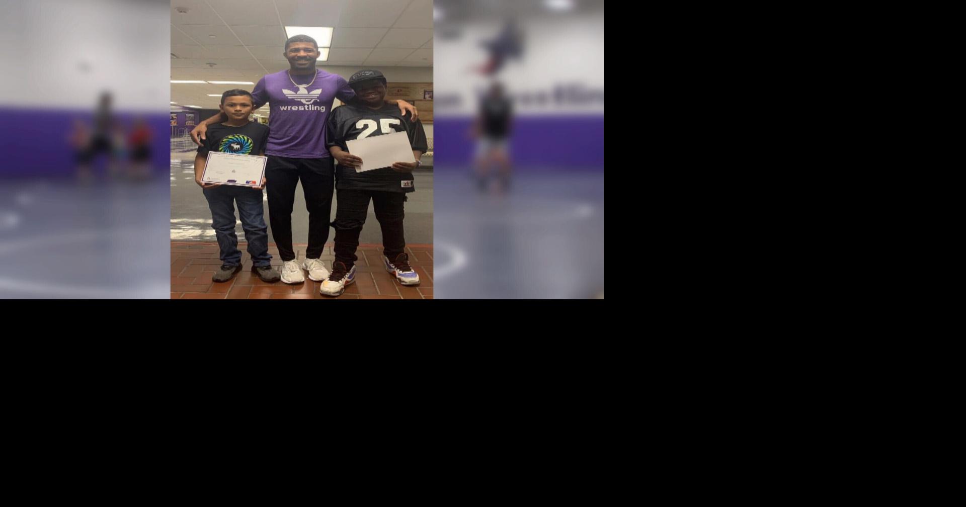 Davis gives back with wrestling scholarships to local elementary