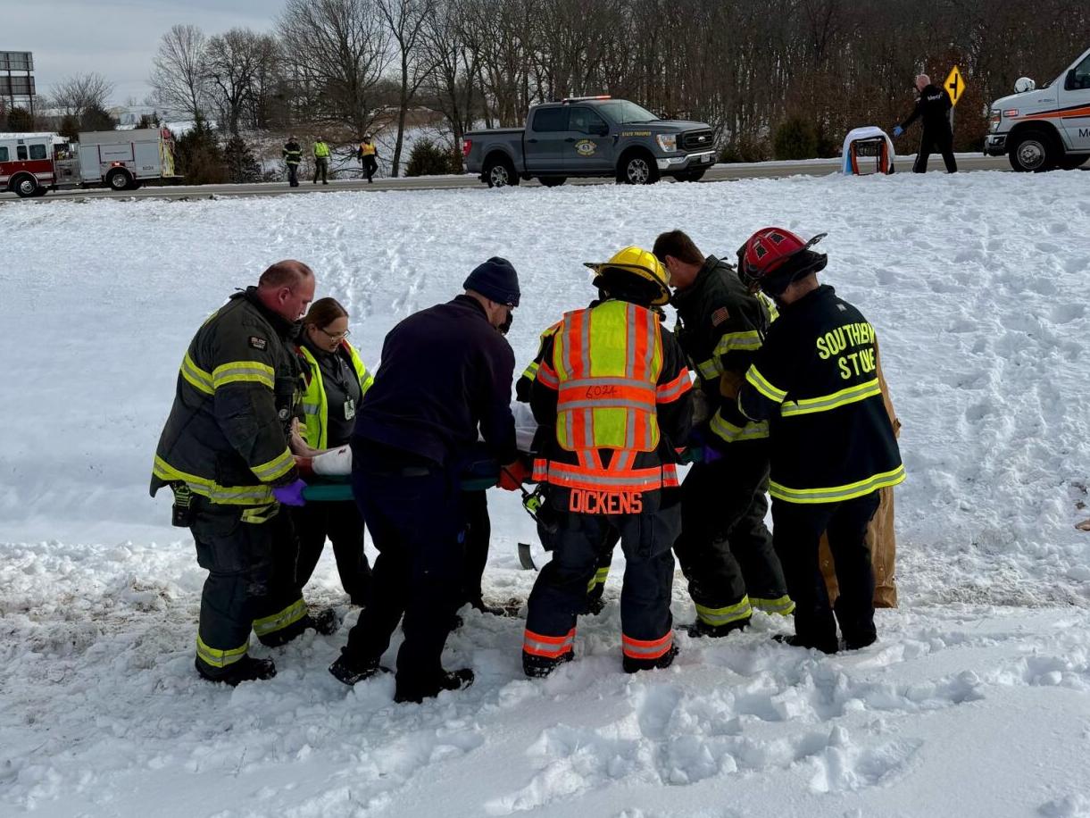 Firefighters use 'Jaws of Life' to free trapped driver, flown from US ...