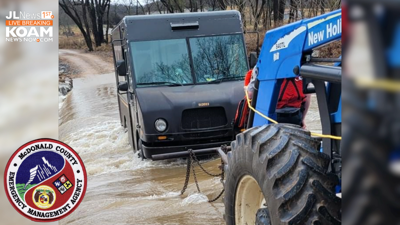UPS truck and driver being pulled to safety from the waters of Pine Creek in rural McDonald County, Mo., February 8, 2023. Courtesy McDonald County Emergency Management.