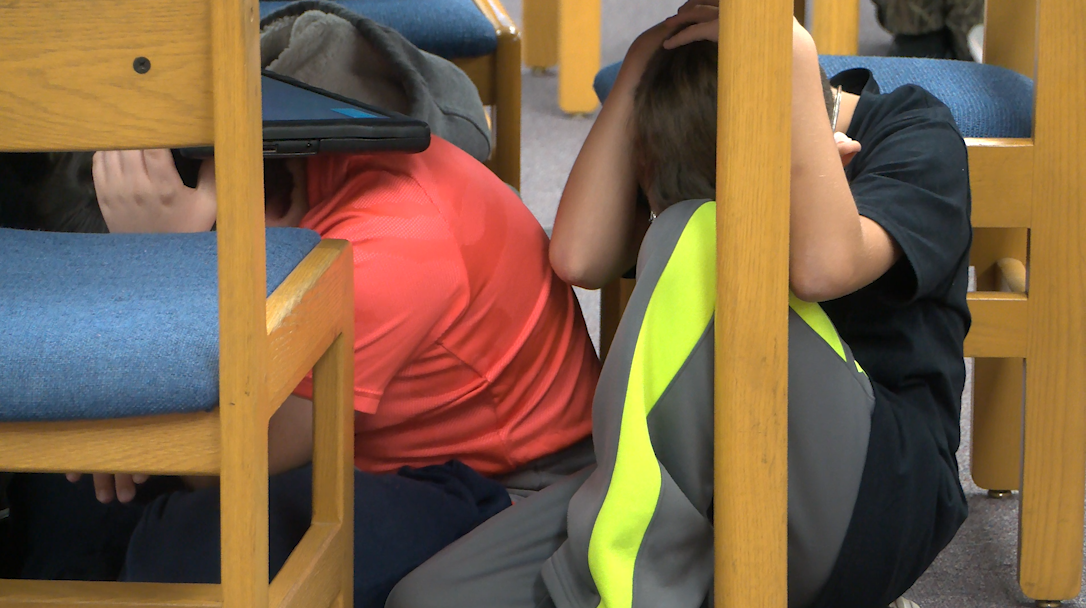 Carl Junction students practice earthquake safety for ShakeOut Day