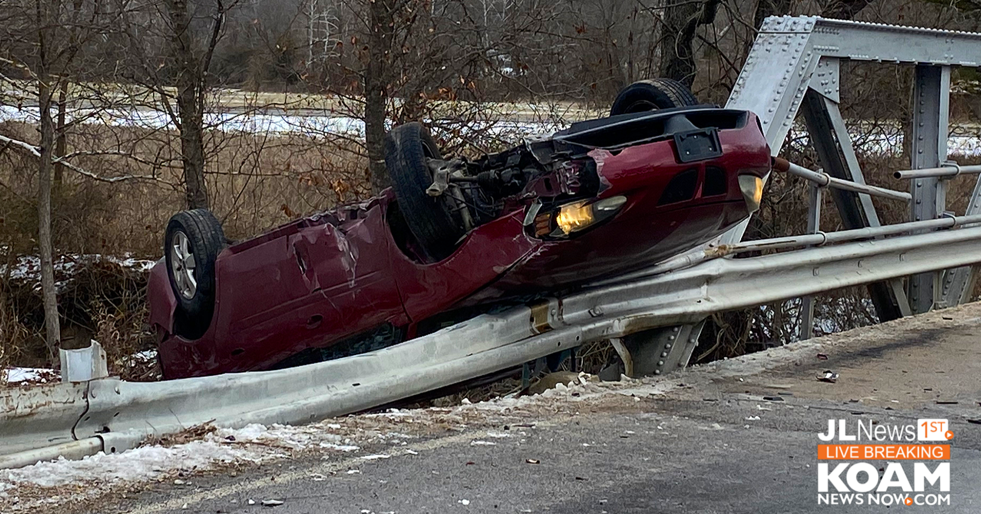Car takes out guardrail, overturning at truss bridge on Dutch Elm - Vimarsana News