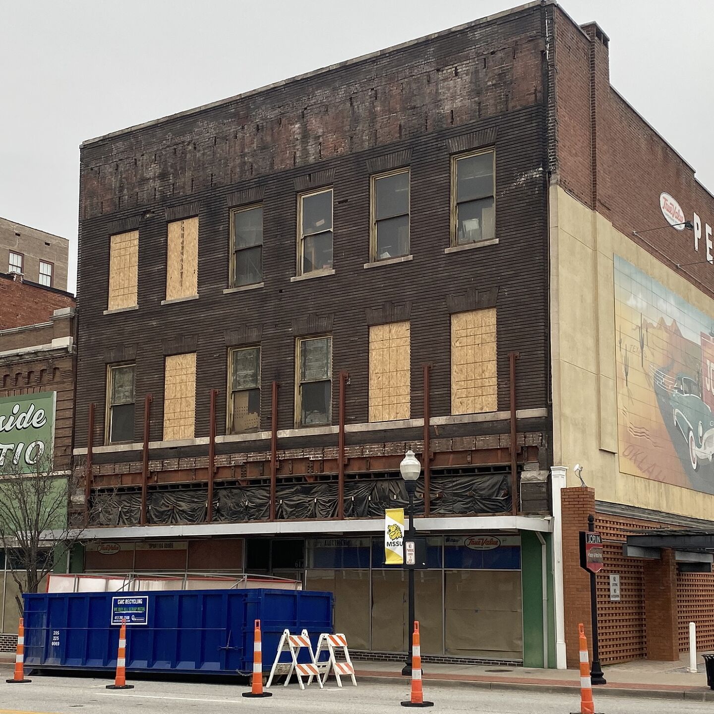 Peeling back the years in Downtown Joplin; Pearl Bros facade comes