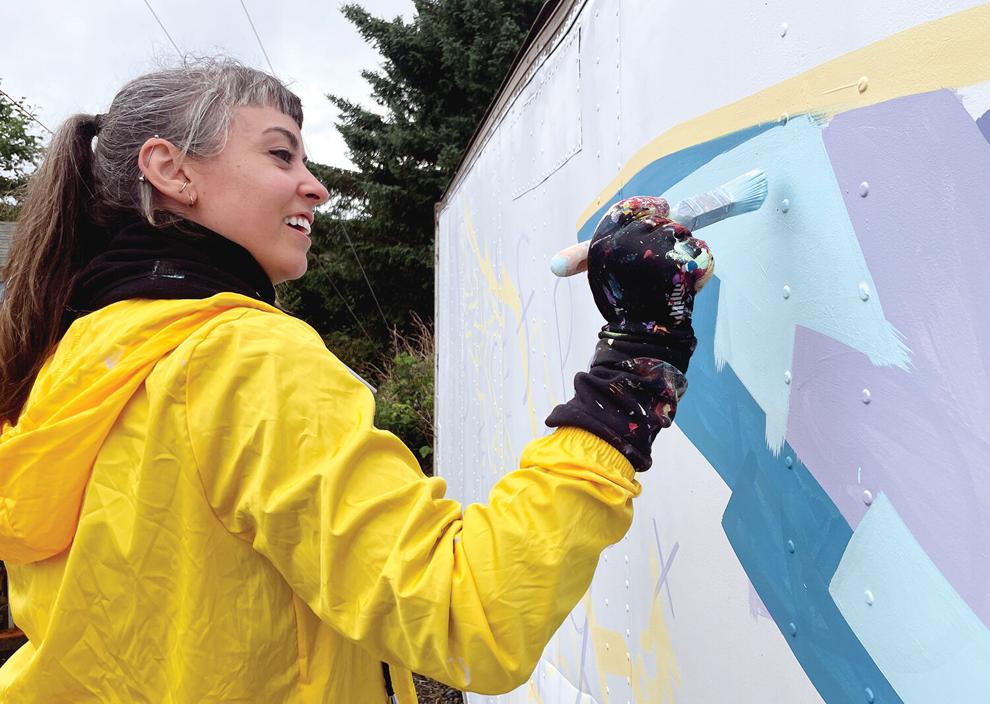 Mural creation marks KMXT’s 50th anniversary