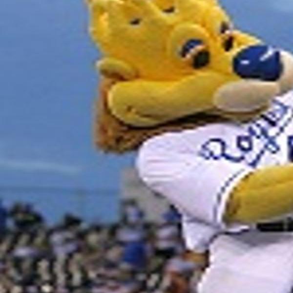 Kansas City Royals mascot Sluggerrr kicks up his heals while