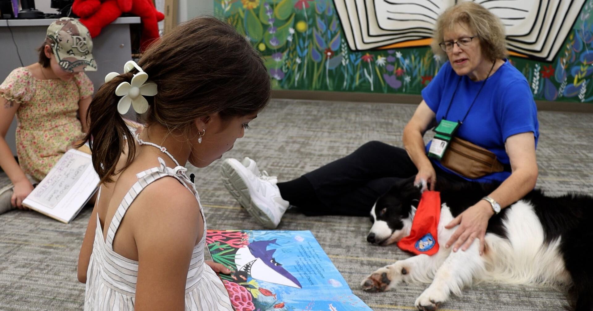 EmVP: Columbia elementary school promotes reading through dogs, new mural - Vimarsana News
