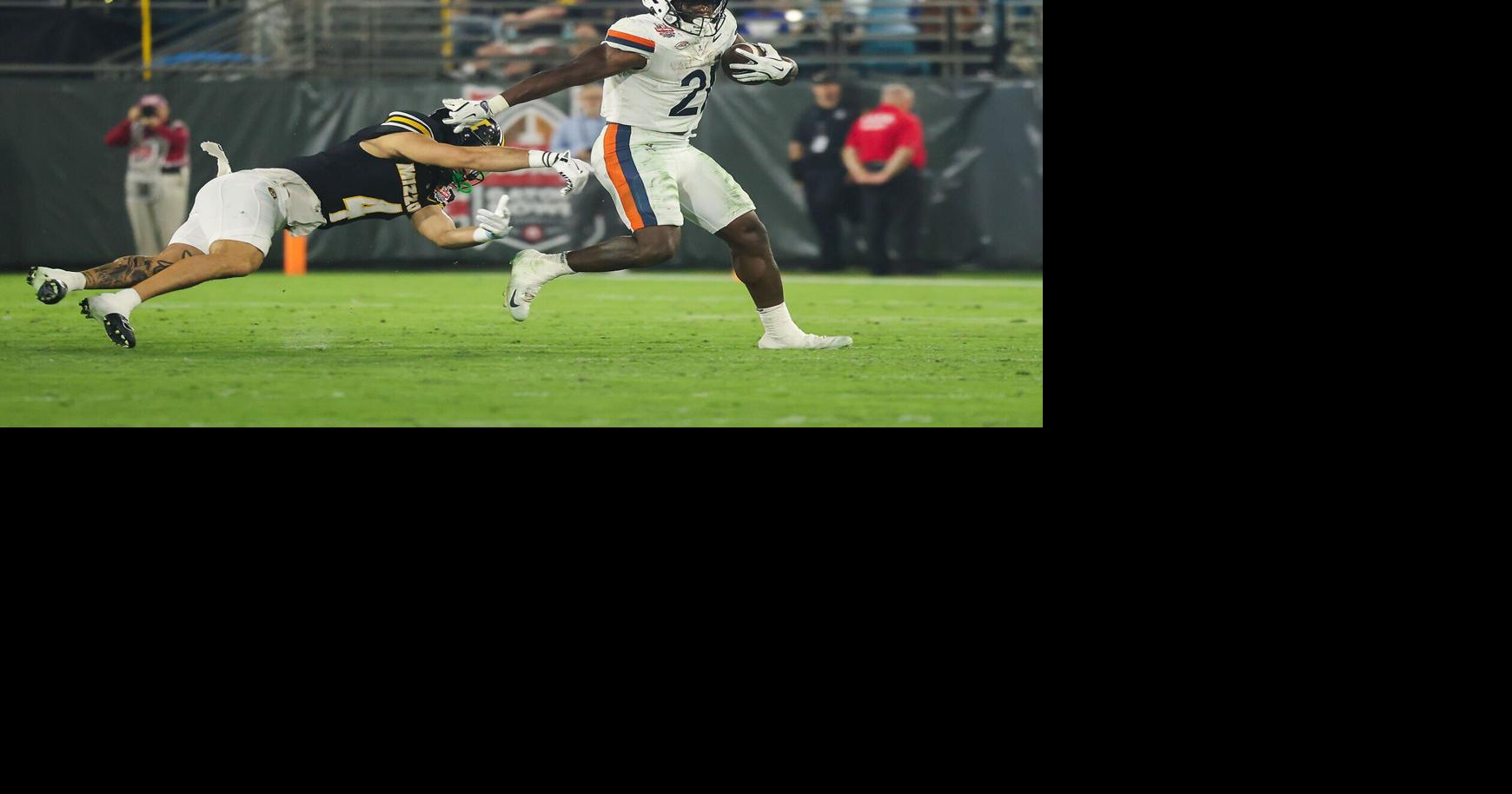 Virginia grinds out Gator Bowl win over Mizzou 13-7