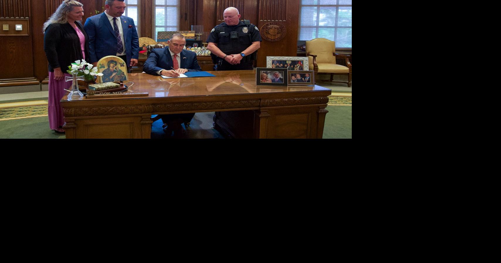Osage Beach police chief meets with governor for signing of bill honoring Phylicia Carson