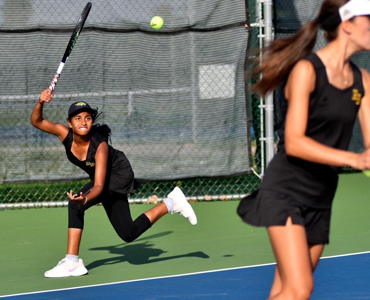 Rock Bridge tennis player Prathyankara Premkumar swings through her forehand