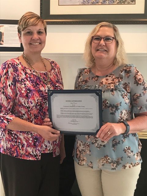Recognized for her service
