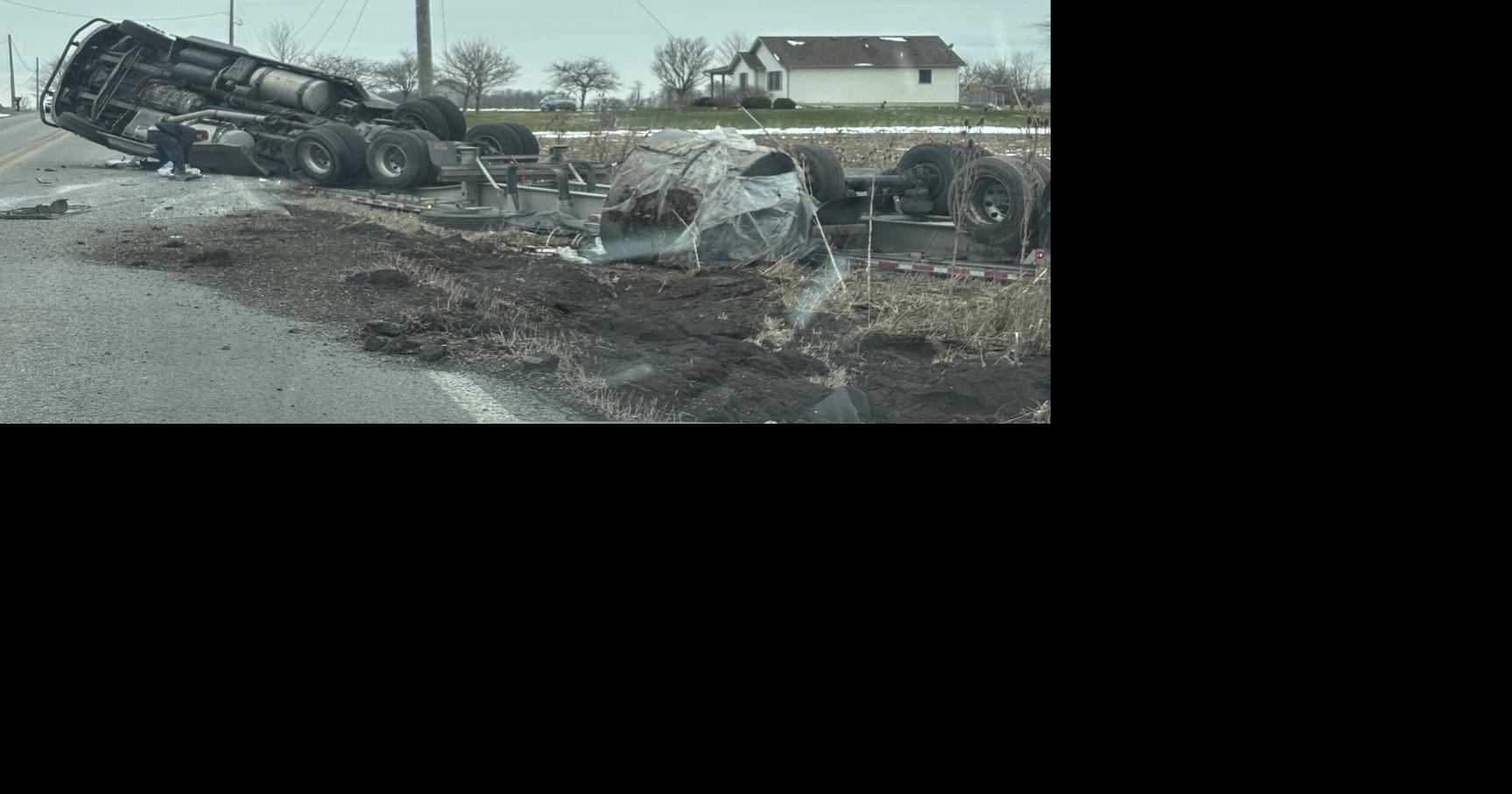New York man not injured when semi overturns
