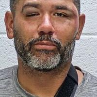 911 caller arrested after fight