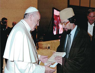 Auburn man’s book presented to pope