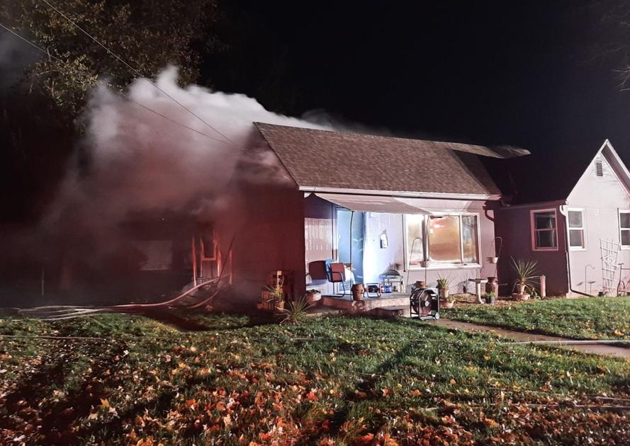 Auburn firefighters battle house fire