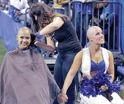 Colts cheerleaders shave their heads to raise funds for leukemia research