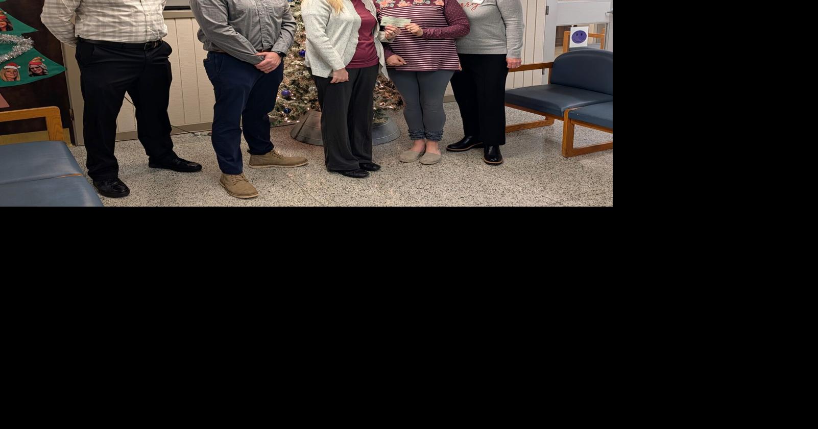 Alpha Rho donates to art classroom