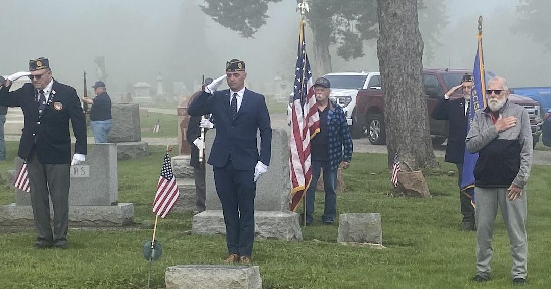 American Legion color guard at cemeteries