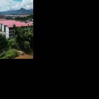 This aerial photo taken on September 17, 2025 from Mae Sot in Thailand shows the KK Park complex in Myanmar's eastern Myawaddy township which the Myanmar military said was a notorious internet scam compound