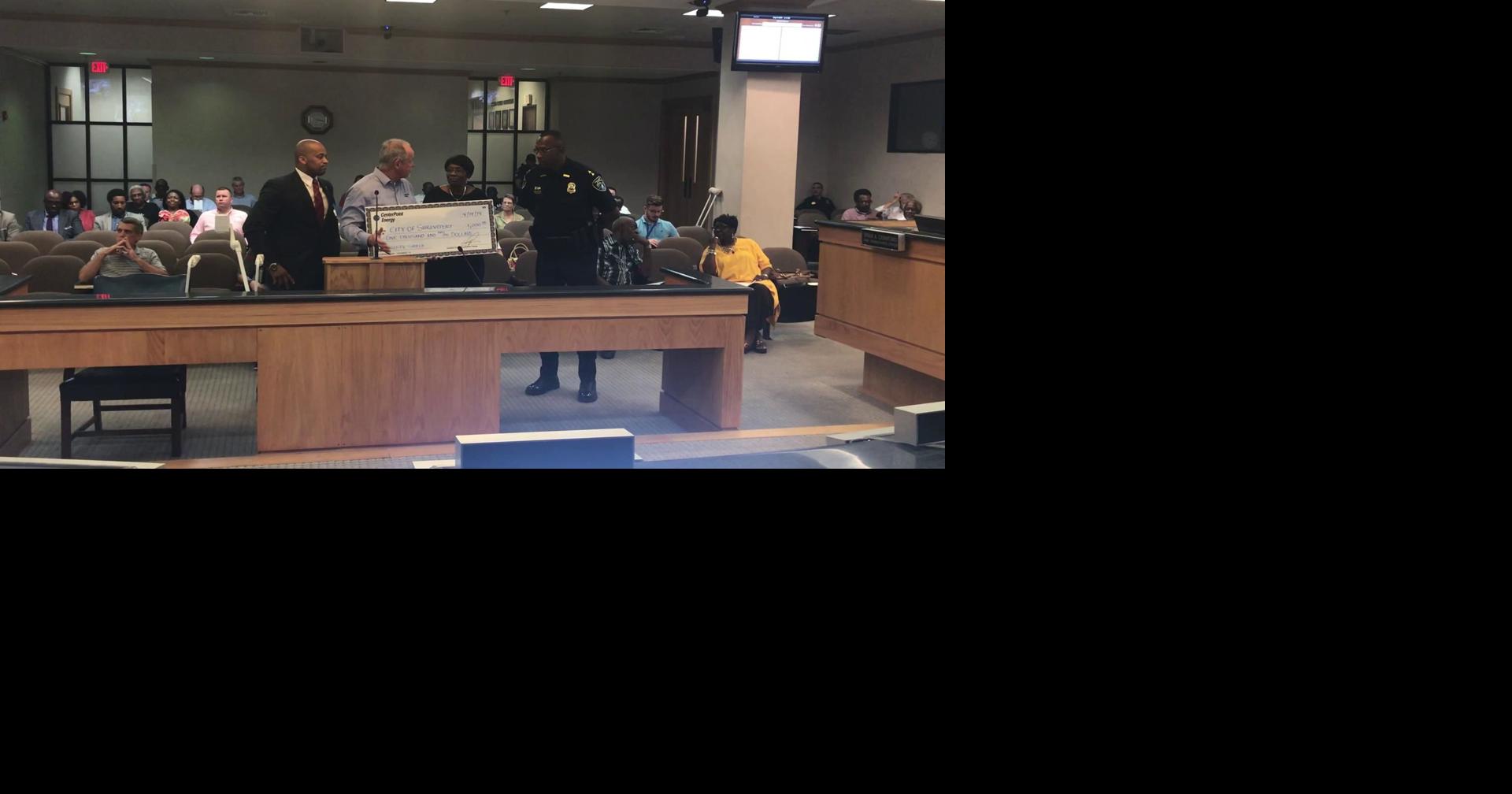 CenterPoint Energy presents a check to the city of Shreveport