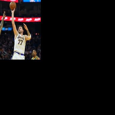 Luka Doncic shoots over Gary Payton II in the Los Angeles Lakers' drubbing of the Golden State Warriors