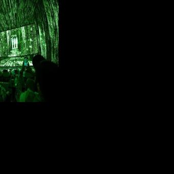 The LA-based Cosm theater has worked to create an environment in which the viewer feels like they are inside the film