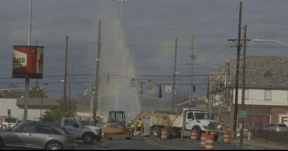 Water main break creates geyser at intersection
