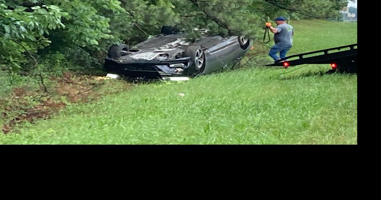 Restrained driver walks away after car flips News