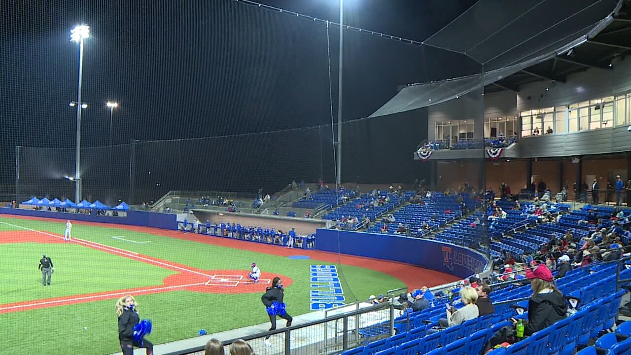 Louisiana Tech catcher Jorge Corona (11) scores an inside the park