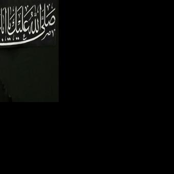 Iran's supreme leader Ayatollah Ali Khamenei waves to the audience in this handout picture released by his office