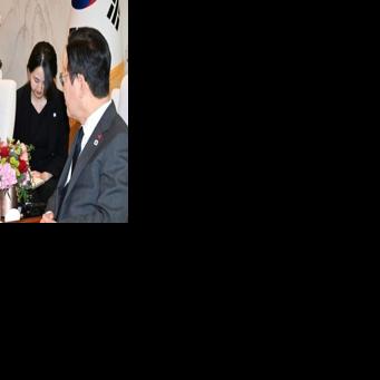 South Korea's President Lee Jae Myung (R) meets with Chairman and CEO of SoftBank Masayoshi Son (L) at the Presidential House in Seoul on December 5, 2025.