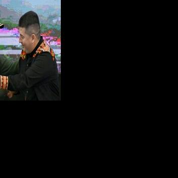 Colombia's President Gustavo Petro (L) greets Royer Garzon, member of Comuneros del Sur, a dissident group of the National Liberation Army guerrilla, in Pasto, Colombia on April 5, 2025
