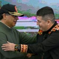 Colombia's President Gustavo Petro (L) greets Royer Garzon, member of Comuneros del Sur, a dissident group of the National Liberation Army guerrilla, in Pasto, Colombia on April 5, 2025