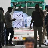 Health officials have begun handing over the first passenger bodies identified through DNA testing