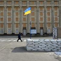 'I think this is a great diplomatic victory for Putin,' one Ukrainian told AFP