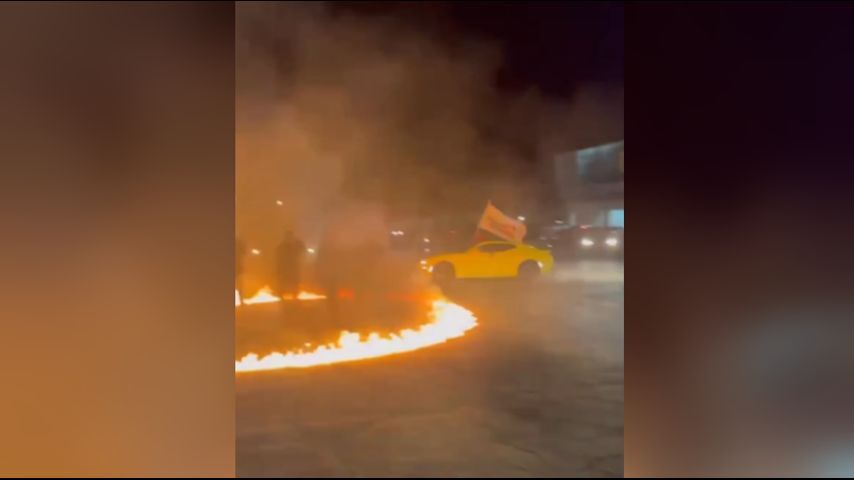 WATCH Street racers set fire to parking lot shut down I 10 in