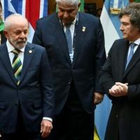 Brazil's President Luiz Inacio Lula da Silva and Argentina's President Javier Milei pose for a photo at a Mercosur summit in Buenos Aires