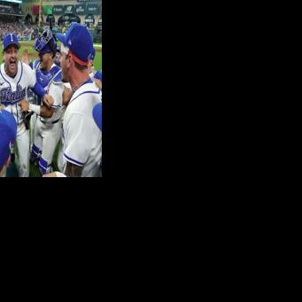 Italy manager Francisco Cervelli (center) celebrates with his players after their 8-6 victory over Puerto Rico saw them advance to the World Baseball Classic semi-finals
