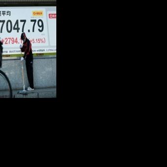 Investors pushed Tokyo's benchmark Nikkei 225 index above 57,000 points for the first time following Prime Minister Sanae Takaichi's resounding victory in a snap parliamentary election