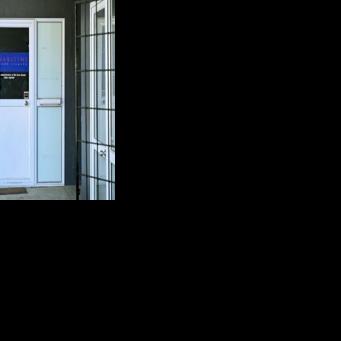 The Cook Islands' shipping registry is nestled next to a pizza shop on the main isle of Rarotonga