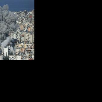 Smoke rises from the site of an Israeli air strike in the southern suburbs of Beirut