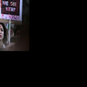 Thousands march in France to back Iranian protesters