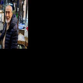 Hong Kong Residents Say Goodbye to the ‘King of Umbrellas’