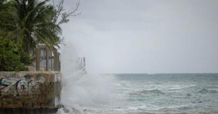 Downgraded Hurricane Erin lashes Caribbean with rain