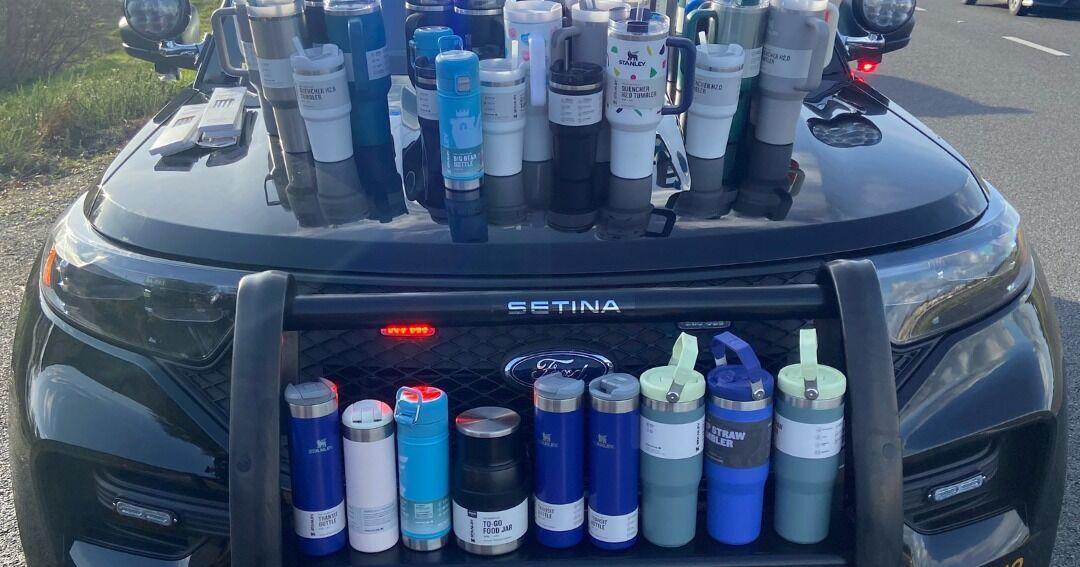 Woman arrested after police seize 65 reportedly stolen Stanley water ...
