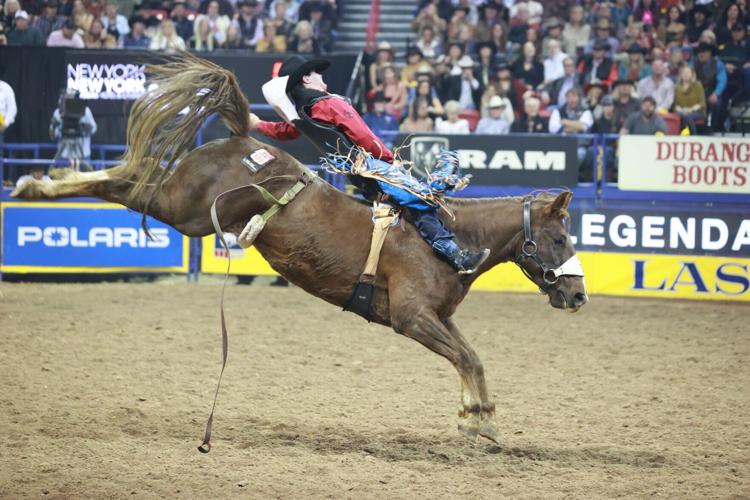 National Finals Rodeo: Wyoming's Cole Reiner wins bareback; Lisa Lockhart  and Chase Brooks place 2nd | Rodeo 