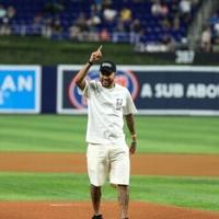 Brazilian footballer Neymar throws the ceremonial first pitch at the Miami Marlins MLB home opener against the Pittsburgh Pirates